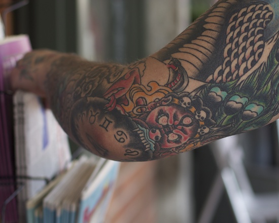 Artistic Arm Reaches For The Paper by seattle