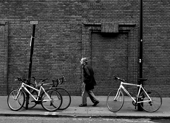 Man and Bikes by andycoleborn