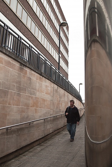 A man walks into an underpass by dulciknit