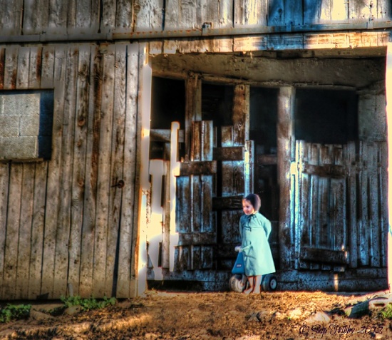 Amish Girl and Her Tricycle by skipt07