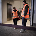 Two workmen (one big, one small)