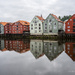 The piers are reflected in the river