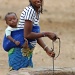 At the well, Burkina Faso by miranda