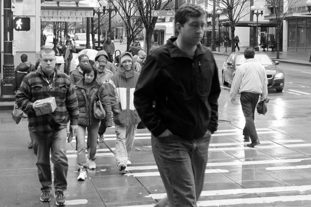 Everyone Is Crossing The Street...With Their Eyes Closed!! by seattle
