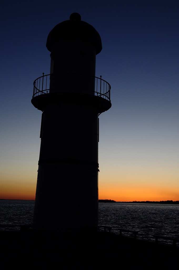 Lighthouse and sunset by dora