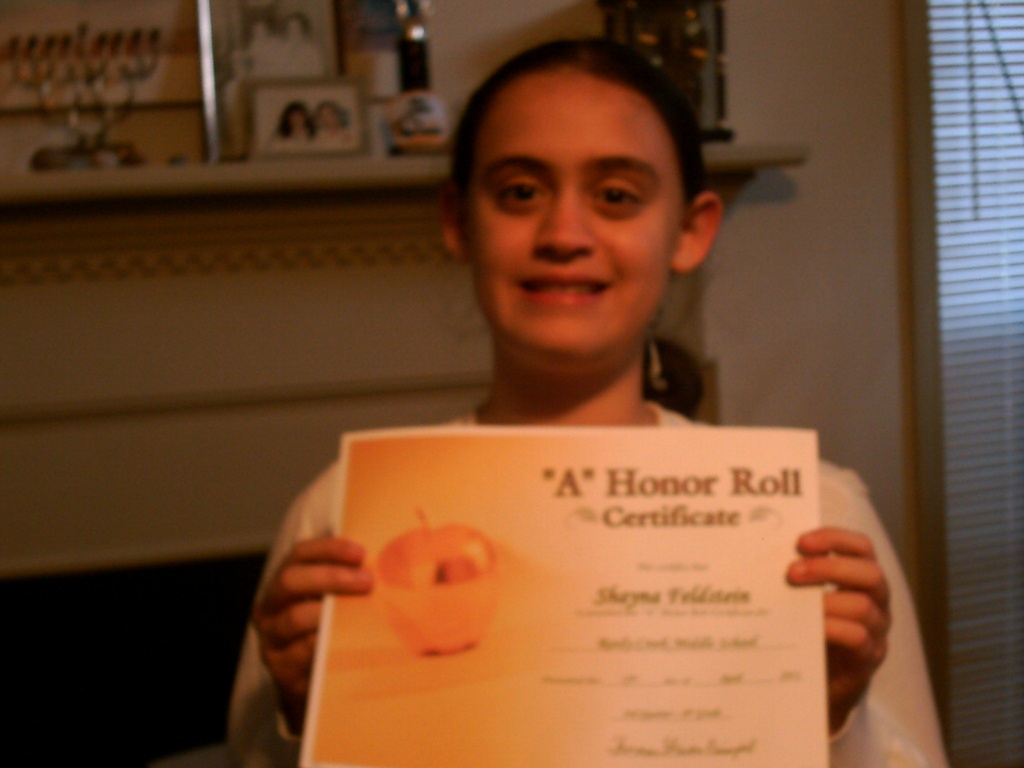 Shayna with A Honor Roll Certificate 4.15.11 by sfeldphotos