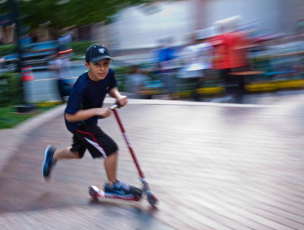 Boy Scootering at 5K Race by jbritt