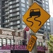 Was It The Showgirls Or The Falling Brick That Causes The Car To Swerve? by seattle