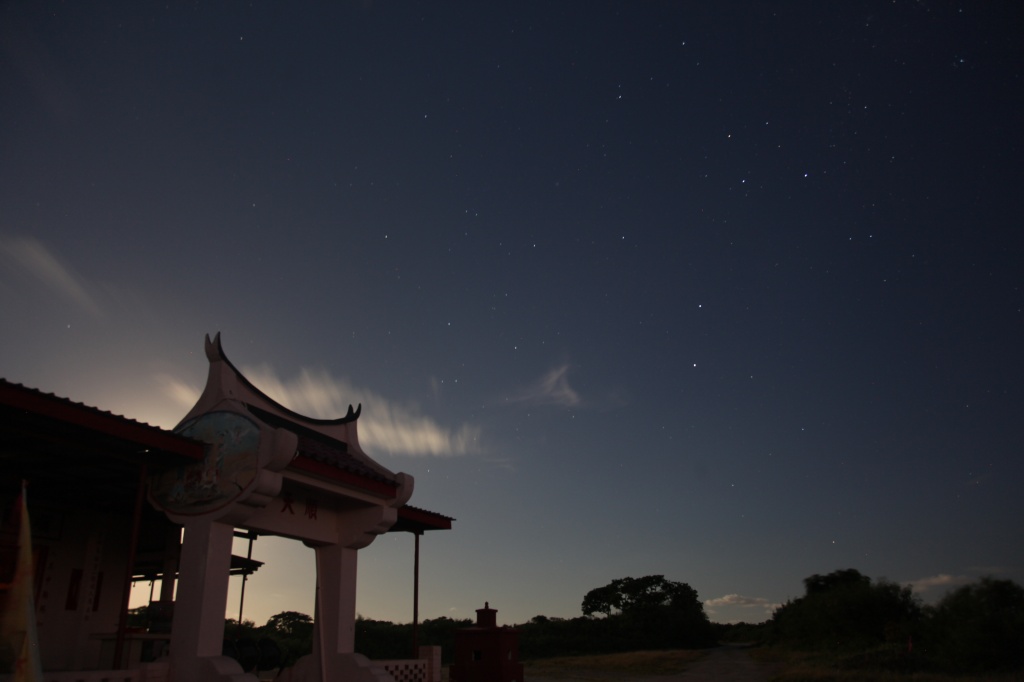 South Point Chinese Temple backlit by moonlight by lbmcshutter