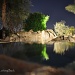 Looking Back ~ The Pool Waterfall At Night by mamabec