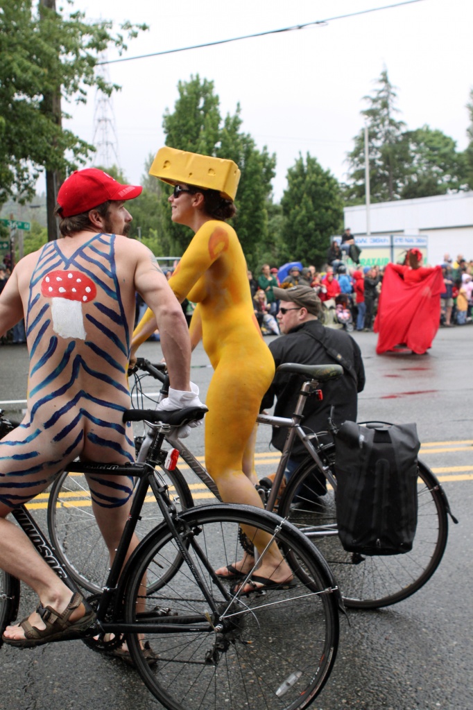 Even The Cheesehead and Mario Stopped To Watch the Parade!  Summer Solstice Cyclists (wearing only body paint) The Fremont Fair! by seattle