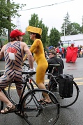 19th Jun 2011 - Even The Cheesehead and Mario Stopped To Watch the Parade!  Summer Solstice Cyclists (wearing only body paint) The Fremont Fair!