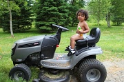 23rd Jun 2011 - Sani loves the lawn mower