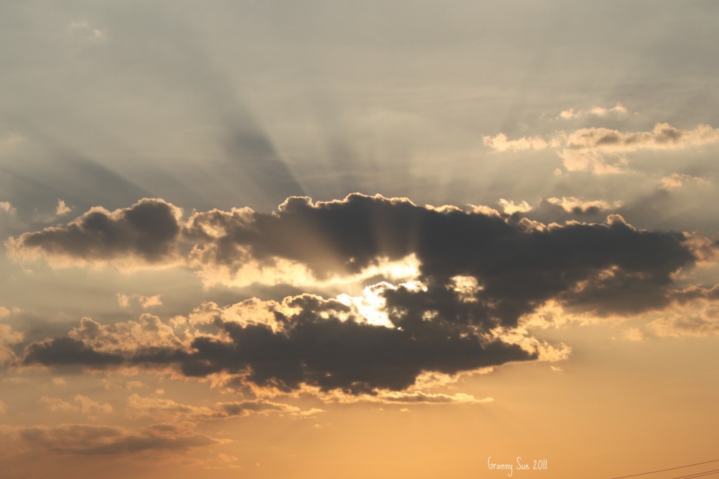 Sun Behind Clouds by grannysue