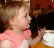 6th Aug 2011 - Immy enjoying a chocolate brownie and a 'baby chino.