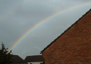 26th Aug 2011 - Up above the streets and houses, rainbow climbing high