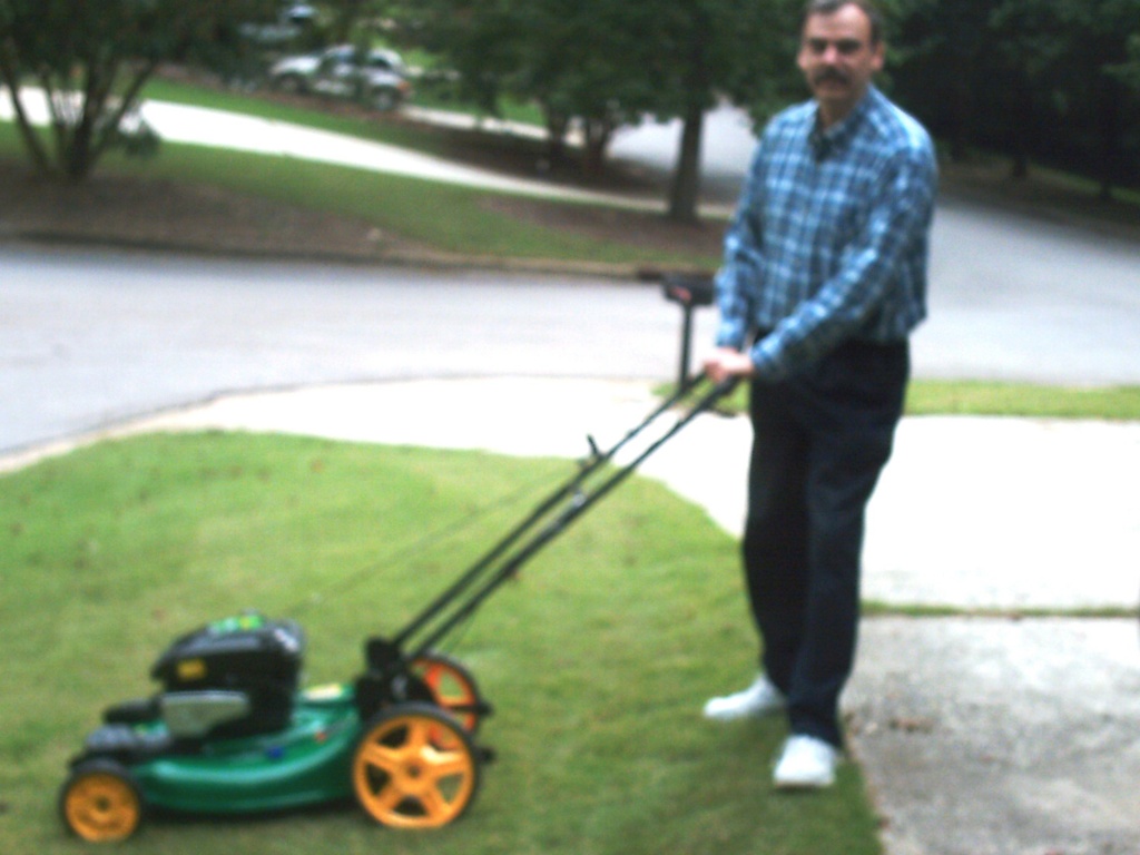 Dad with New Lawn Mower 9.18.11 by sfeldphotos