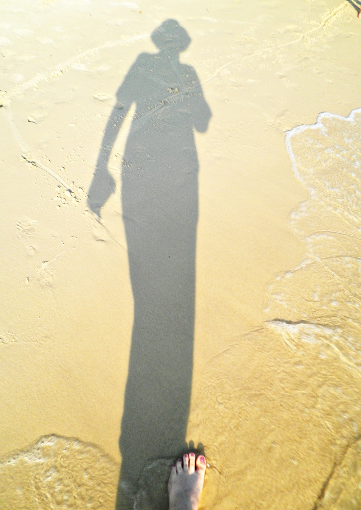 shadow and foot. by corymbia