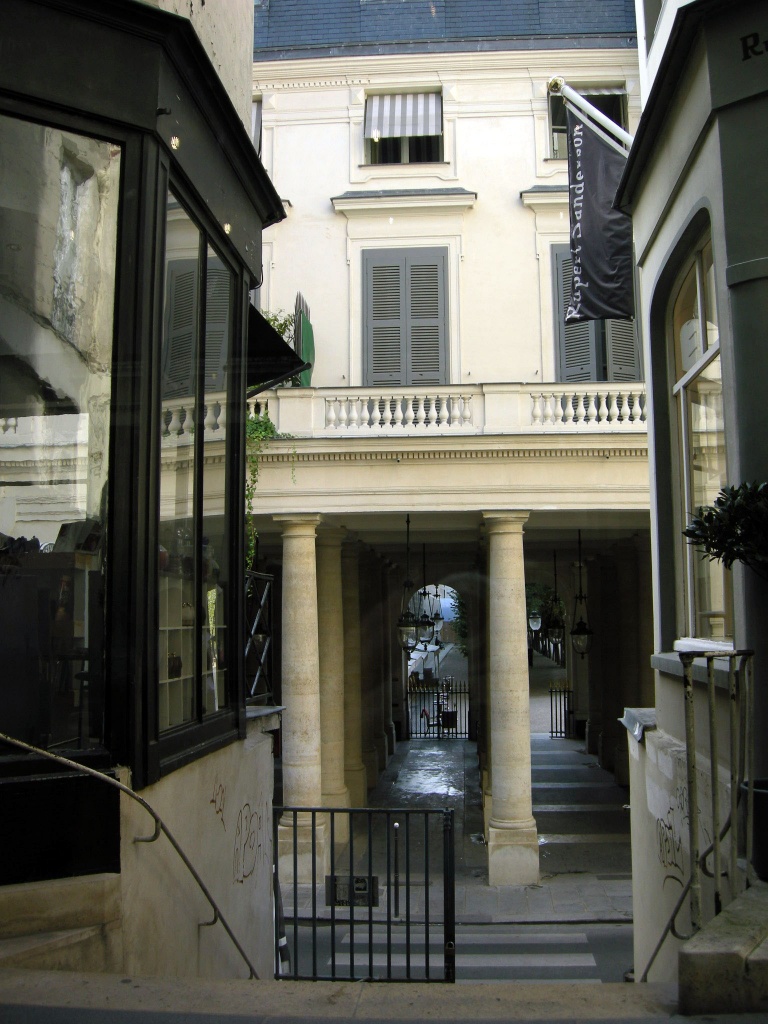 Entrance of the Palais Royal garden  by parisouailleurs