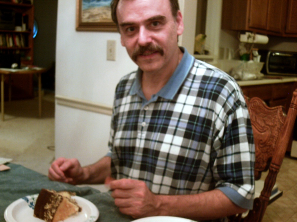 Dad with Piece of Cake 9.24.11 by sfeldphotos