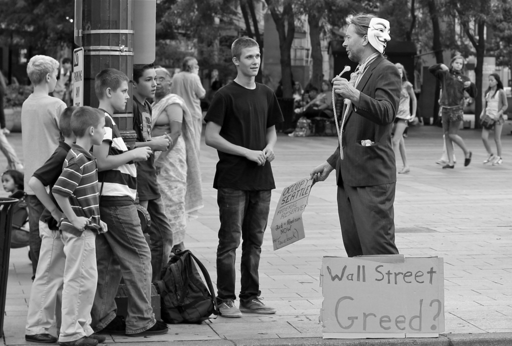 Wall Street Greed Being Taught To The Youth! by seattle
