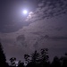 full moon on ocean by jgpittenger