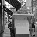 Managing The Packages On The Street.  A UPS Employee At Work.   by seattle