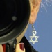 Refleciton of a Chanukah Earring by sharonlc