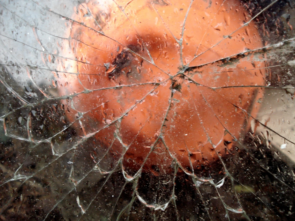 Buoy behind broken glass by overalvandaan