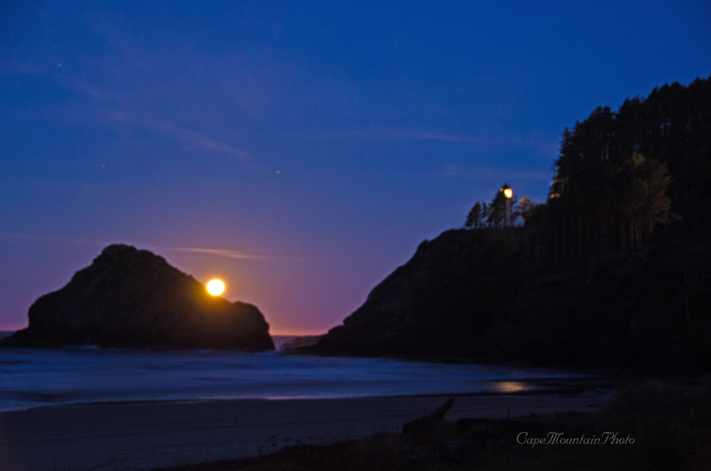 Twilight Full Moon Falling Into the Ocean by jgpittenger