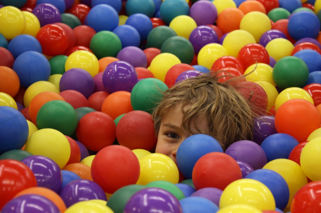 Lost in the ball pit by kiwichick