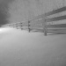 Fence rail in snow by ggshearron