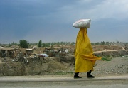 24th Jan 2012 - Another shot from a moving car - Afghan lady with her shopping