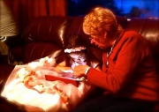 28th Jan 2012 - granddaughter entranced by iPad?