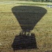film Feb - hot air balloon coming in for a landing - one of the shadows is me by lbmcshutter