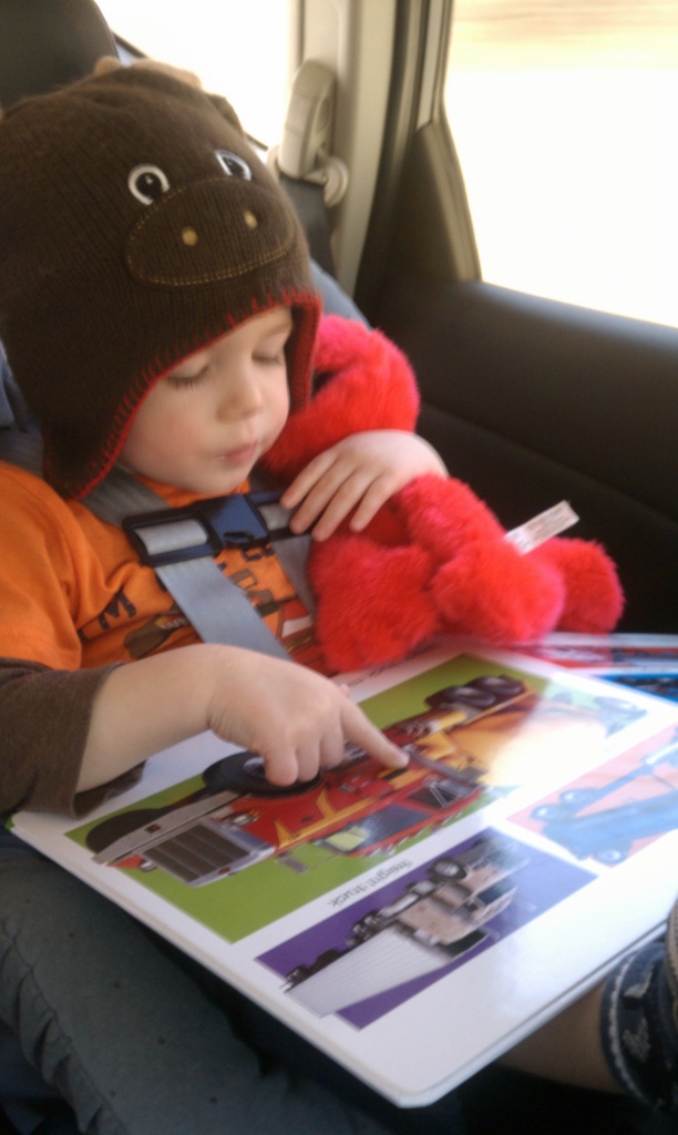 Teaching Elmo about trucks by egad
