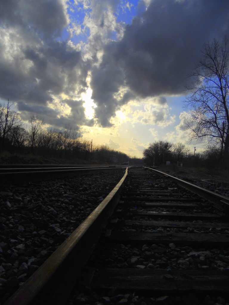 Sun Setting on the Tracks by yentlski