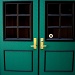 Green door by mittens