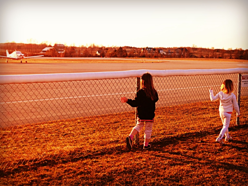 Watching the airplanes. by edie