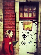 16th Mar 2012 - Red Coat, Yellow Dog, Red Bricks, Yellow Flower