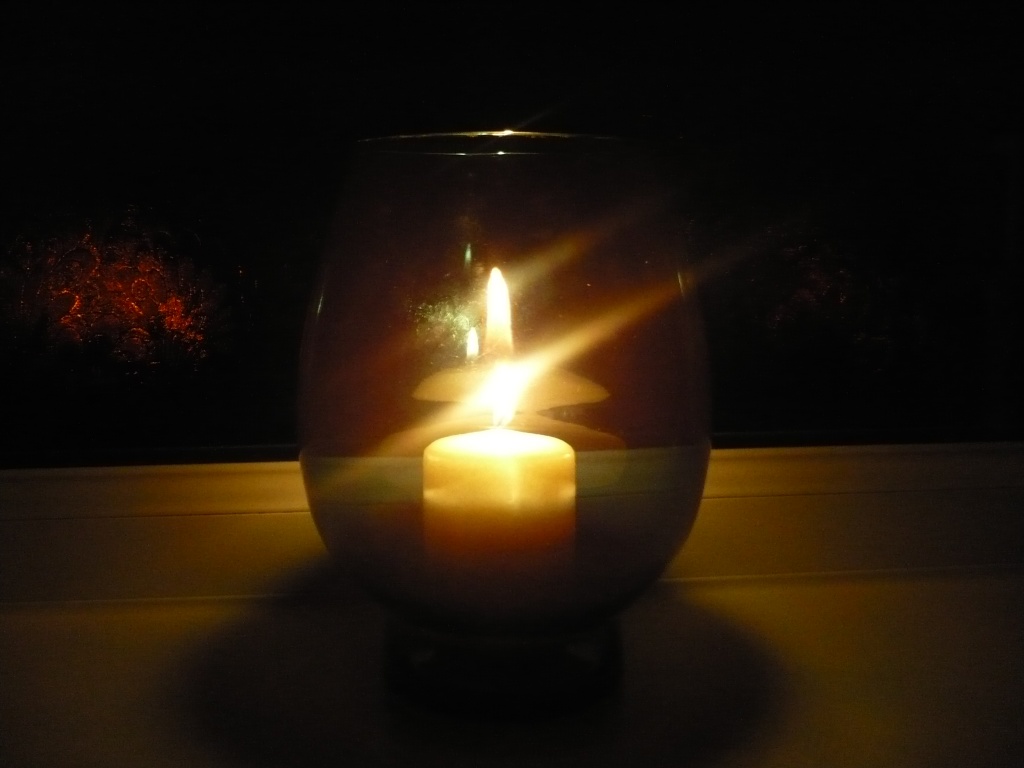 candle in a jar by clairecrossley