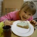 Honey enjoying her pudding!   by jennymdennis