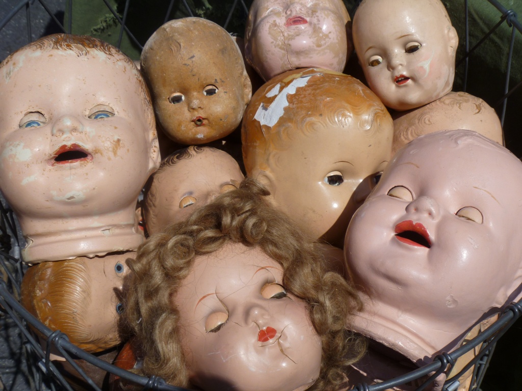 Doll heads in a basket by handmade