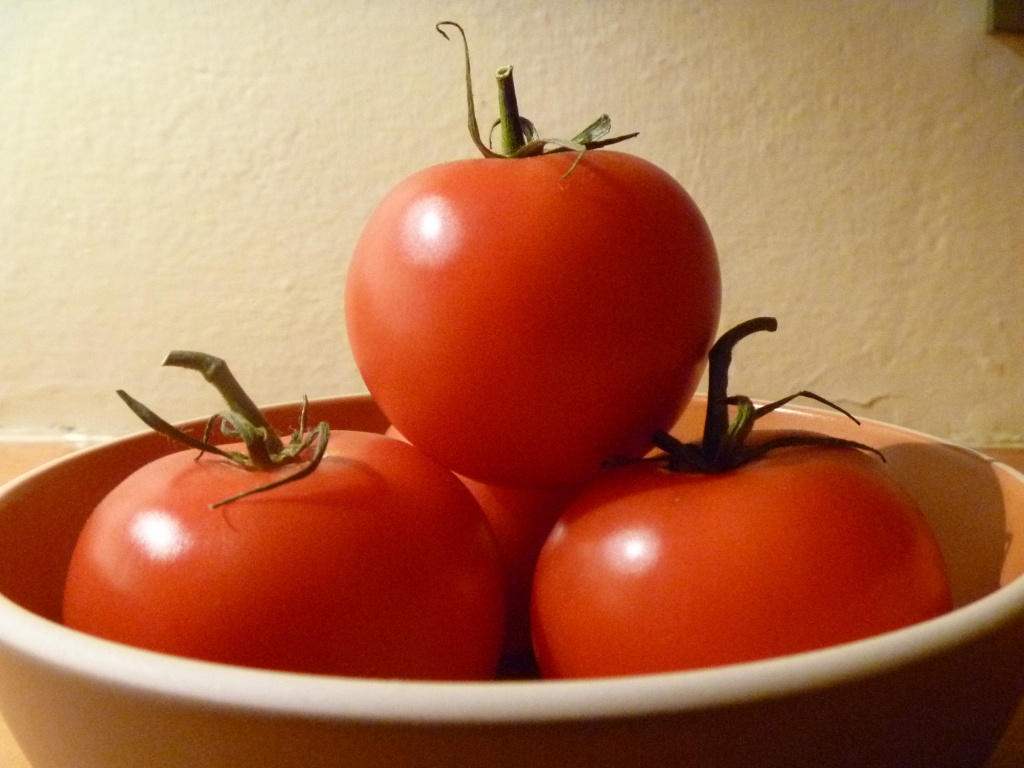 Tomatoes in a bowl by handmade
