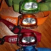 Four little headlamps sitting in a row by eleanor