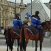 Mounted police at the Pyramide du Louvre by parisouailleurs