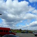 Clouds over a tilted parking lot by mandyj92