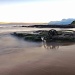 Wheels in the tide - dawn by peterdegraaff
