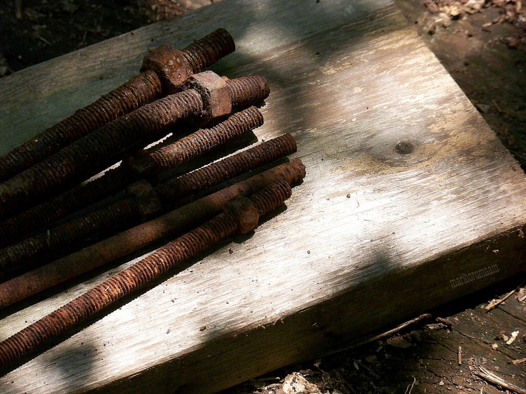 rusty nuts and wood... by marlboromaam