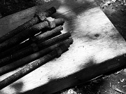 25th Apr 2012 - Black and white version of rusty nuts and wood...